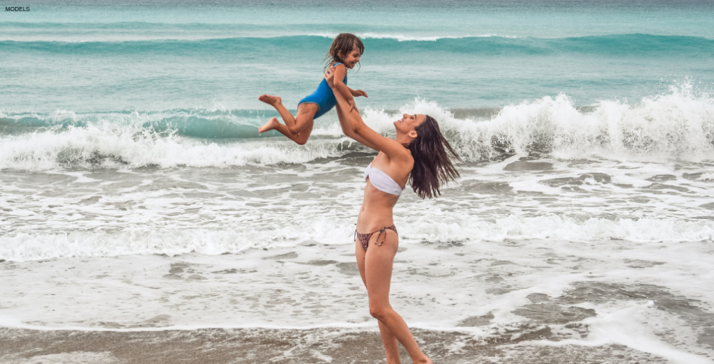 Woman on beach after diVa treatment