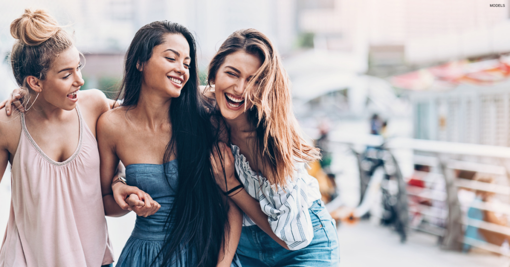 Women enjoying summer and laughing after BOTOX treatment