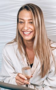 Smiling woman with champagne