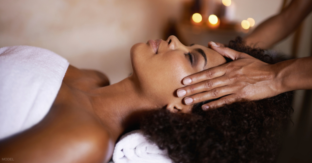 Woman in Vero Beach, FL receiving massage at White Orchid Spa