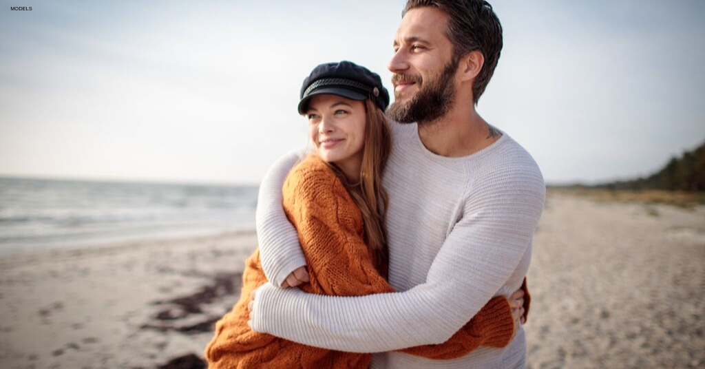 Couple smiles in Vero Beach after treating sun damage at White Orchid Spa