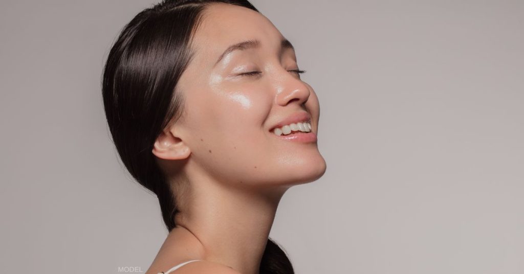 Woman with beautiful hydrated skin (model)